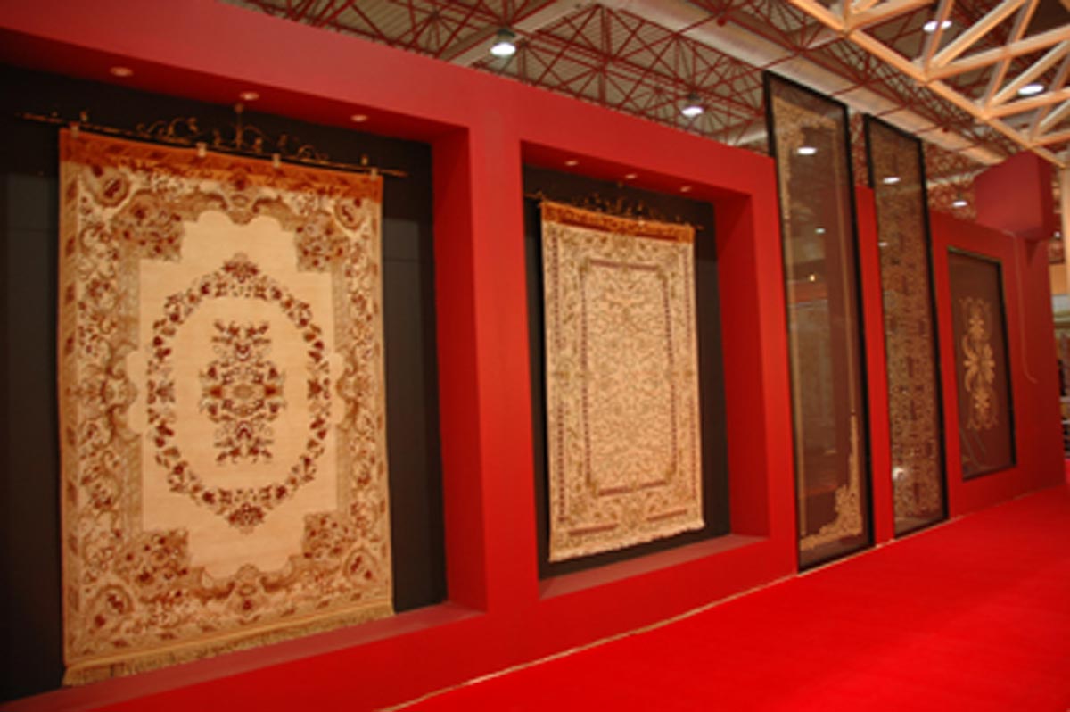 Red Trade Stand displaying rugs
