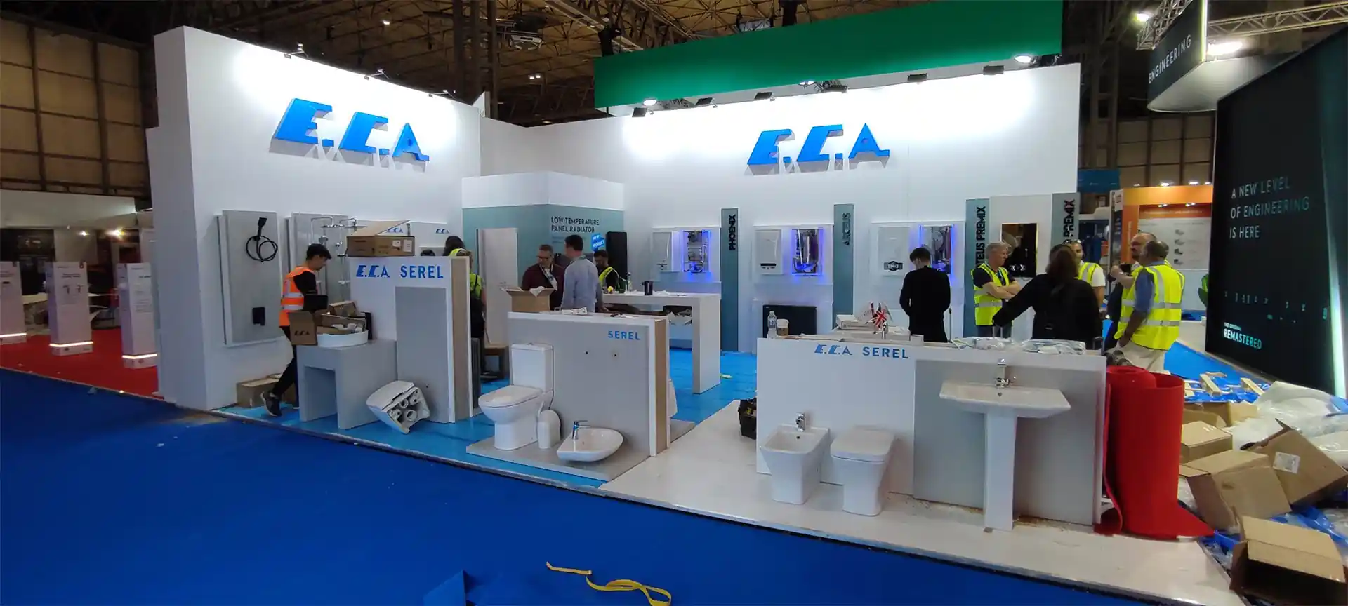 ECA white exhibition booth displaying products