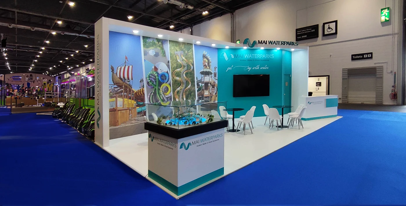 a trade show stand placed on a vibrant dark blue carpet.